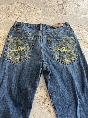 Y2K Distressed Rocawear Dark Blue Jeans with Yellow Embroidered Back Pockets
